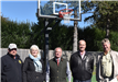 Image of Lola Prentice basketball court opening group photo