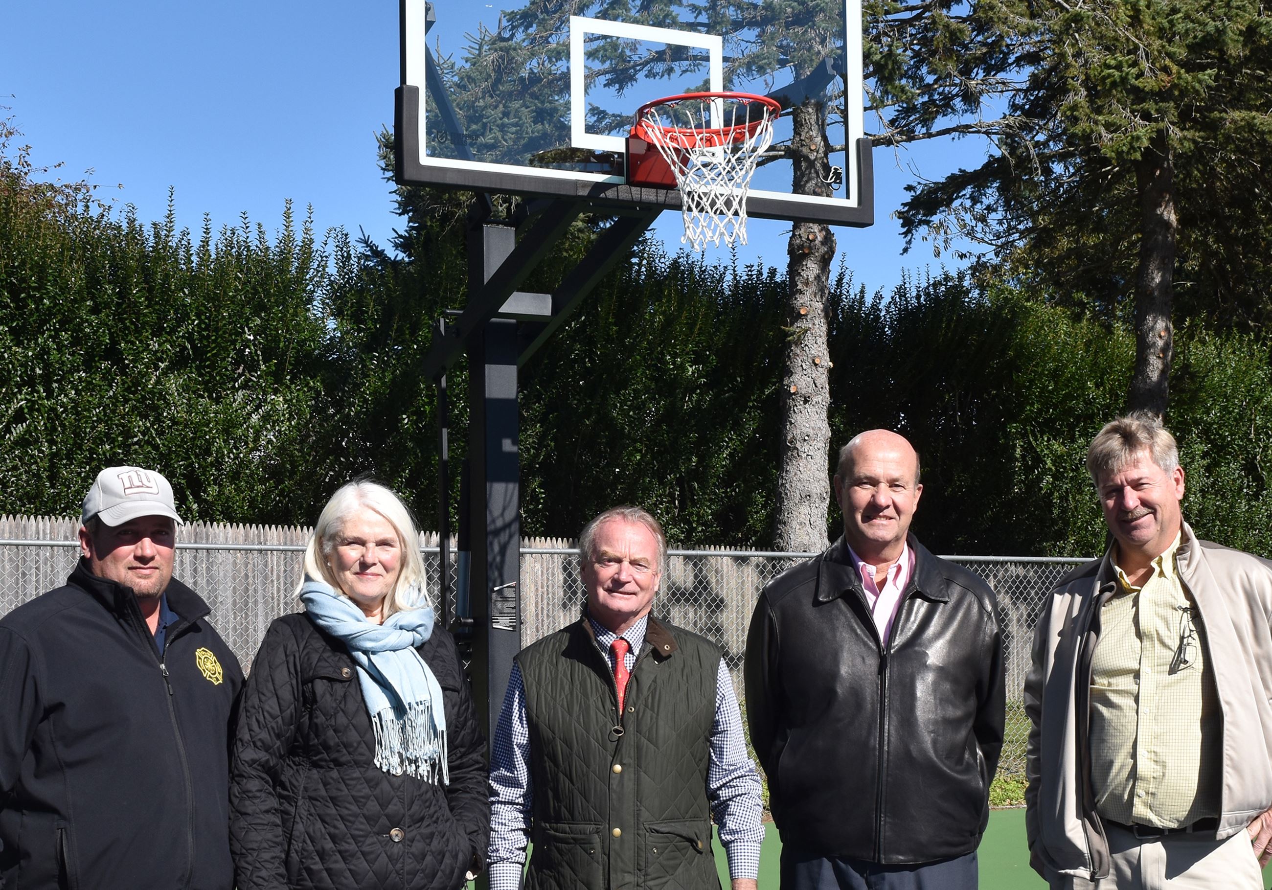 Image of Lola Prentice basketball court opening group photo